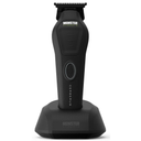 Monster Clippers Cerberus Hair Trimmer in black front view on charging stand on white background
