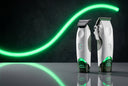 BabylissPRO X Tomb45  White Edition Clipper and Trimmer on a black background with neon green curved line