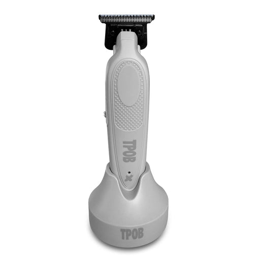 Gray hair trimmer with 'TPOB' branding on a white background