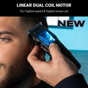 Person using a hair clipper with text highlighting 'Linear Dual Coil Motor' and 'NEW' on a blue background.