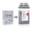 Two boxes of Zotos Professional Quantum Extra Body supplement shown side by side with a gray arrow between them and the text 'NEW LOOK, SAME GREAT PERFORMANCE!' above. The left box is plain white and gray, and the right box has a gray geometric pattern with a white label and a red circular badge.