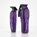 Two purple REIGN clipper grooming tools on a clean white background, one standing vertically and the other open, both showing the REIGN branding and black cutting heads.