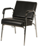 Black shampoo chair with a chrome metal frame, featuring padded armrests and a high backrest, shown on a white background.